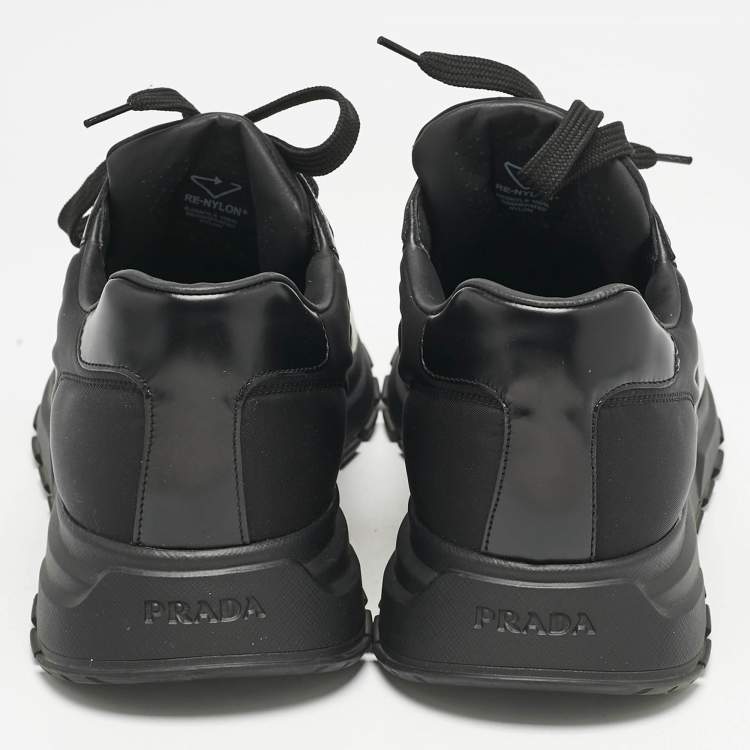 مملوكة مسبقًا Prada Black Leather and Nylon Triangle Logo Low Top Sneakers Size 42