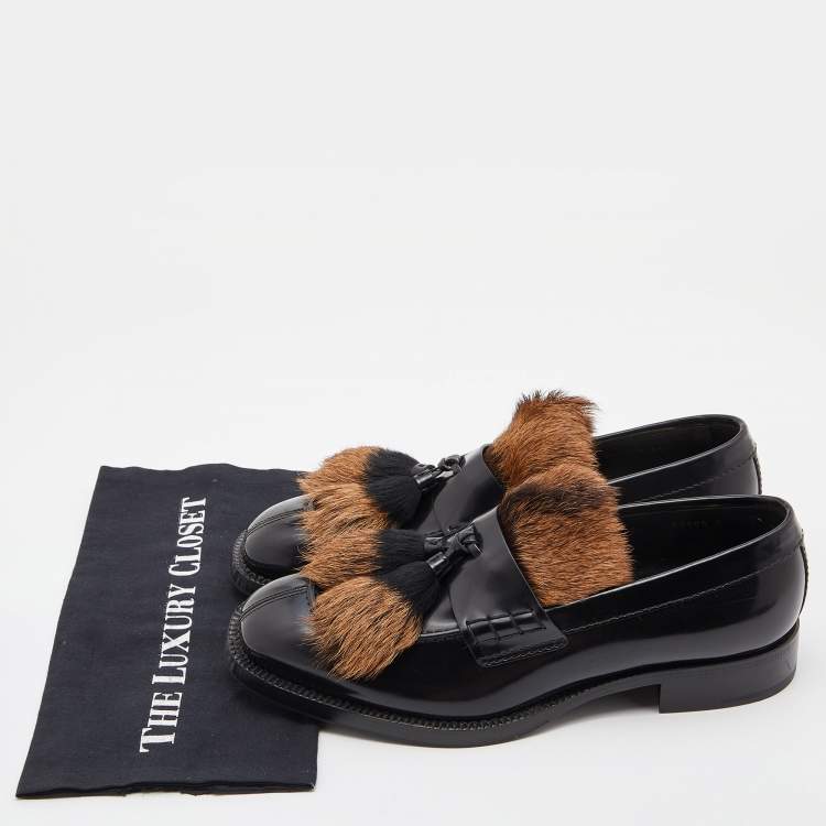 مملوكة مسبقًا Prada Black Leather and Calf Hair Tassel Slip on Loafers Size 42.5