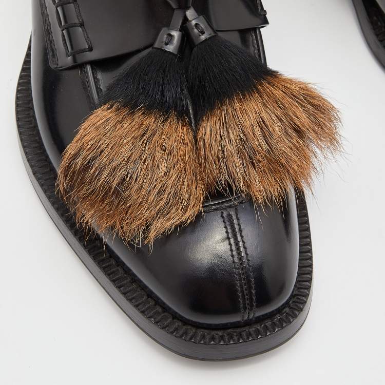 مملوكة مسبقًا Prada Black Leather and Calf Hair Tassel Slip on Loafers Size 42.5
