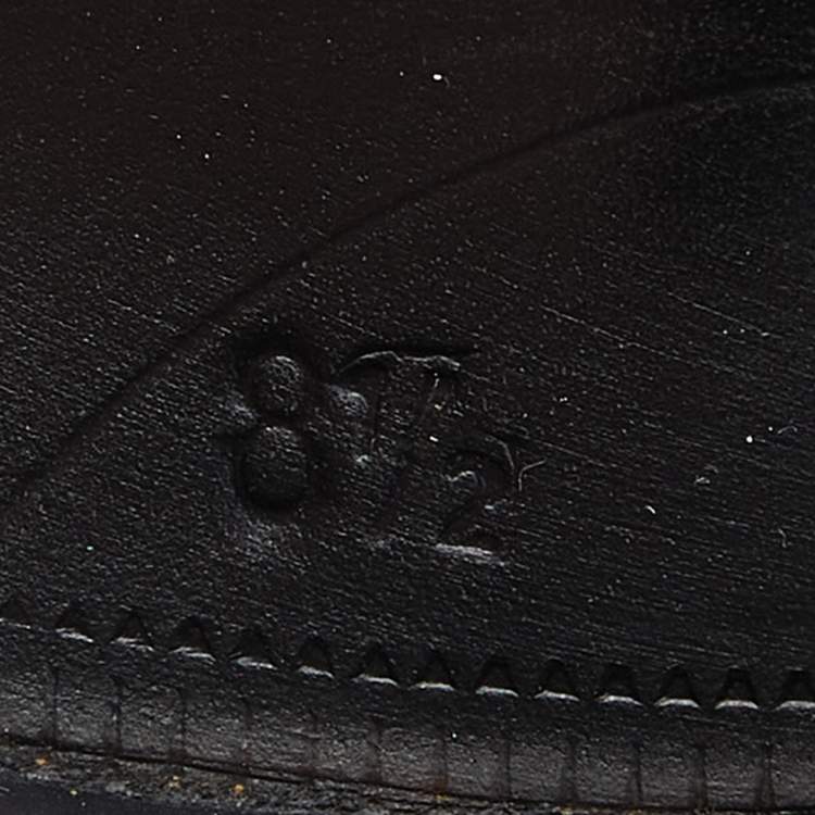 مملوكة مسبقًا Prada Black Leather and Calf Hair Tassel Slip on Loafers Size 42.5
