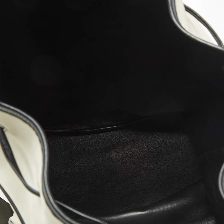 Pre Owned Saint Laurent Cream/Black Nubuck and Leather Rive Gauche Sling Bag