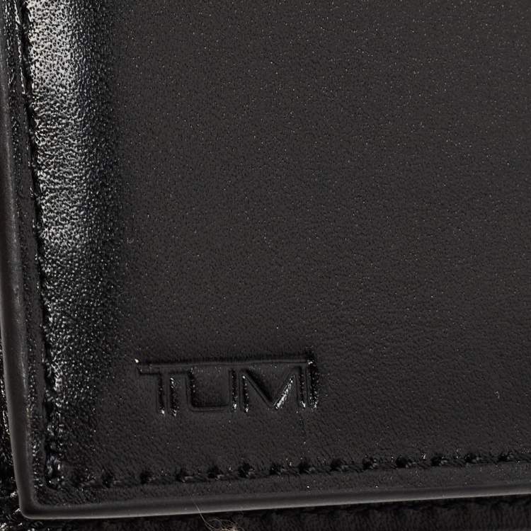 Pre Owned Tumi Black Leather Global Vertical Flip Coin Wallet