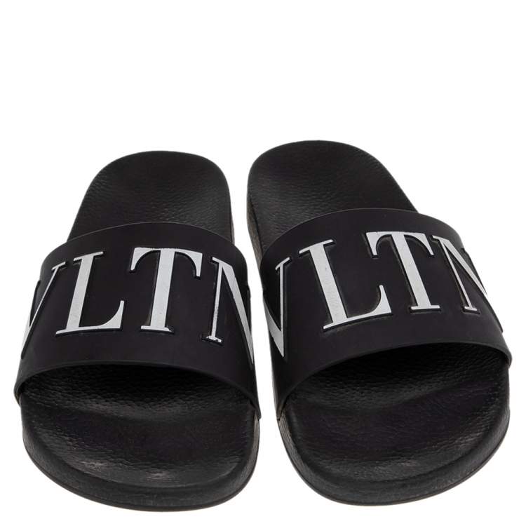 Pre Owned Valentino Black/White Rubber VLTN Flat Slides Size 42