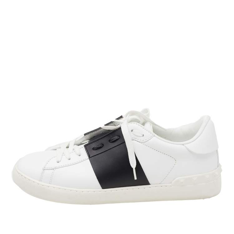 White sneakers store with black band