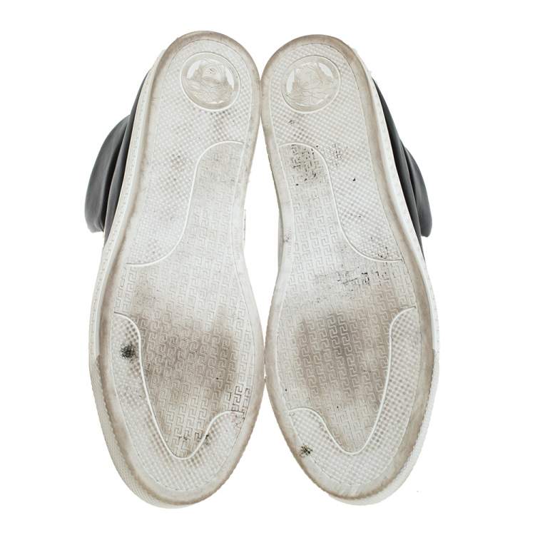 black slip on high top sneakers