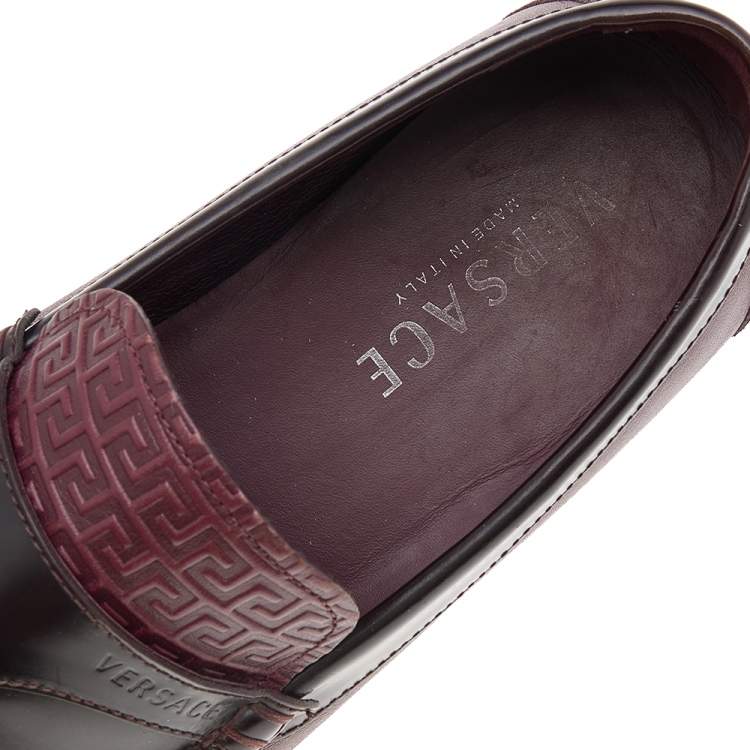 Pre Owned Versace Burgundy Monogram Embossed Leather Slip On Loafers Size 43