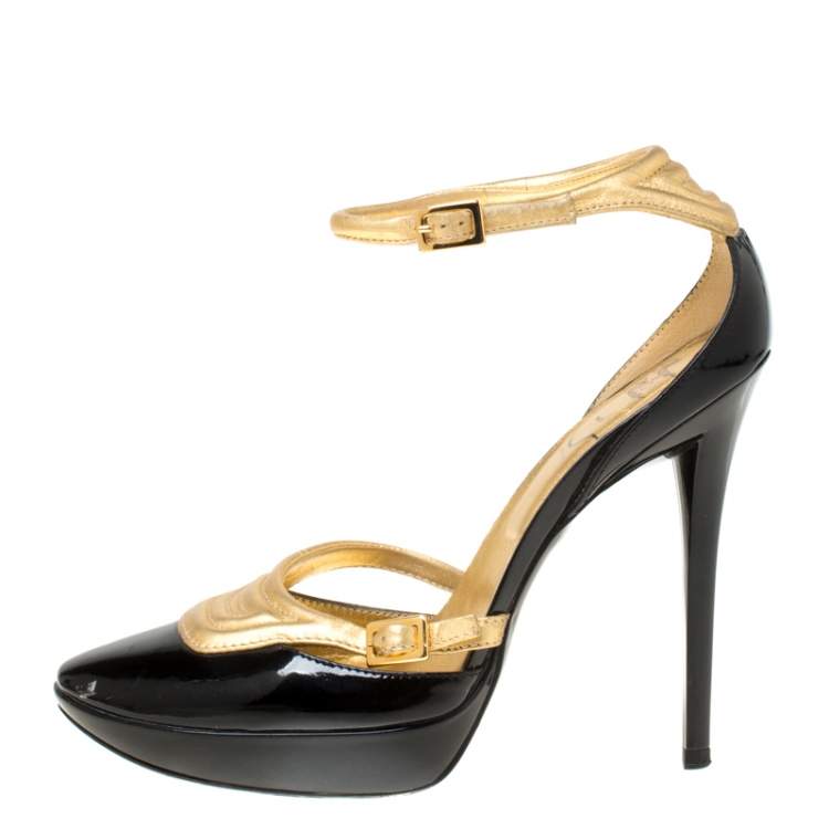 black heels with gold ankle strap