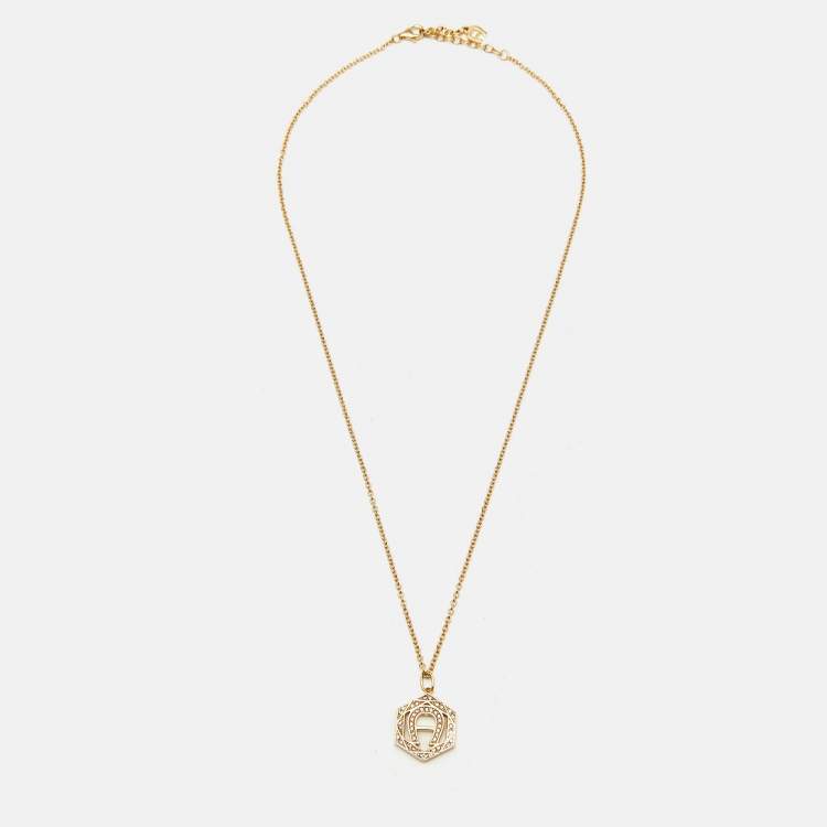 Pre Owned Aigner Logo Crystals Gold Tone Necklace Bracelet Earrings Set