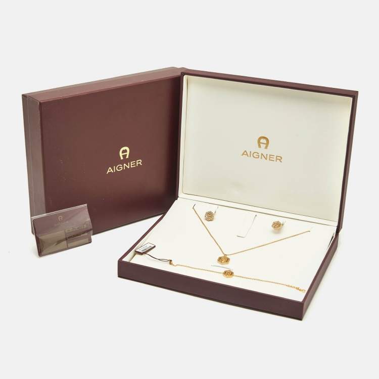 Pre Owned Aigner Logo Crystals Gold Tone Necklace Bracelet Earrings Set