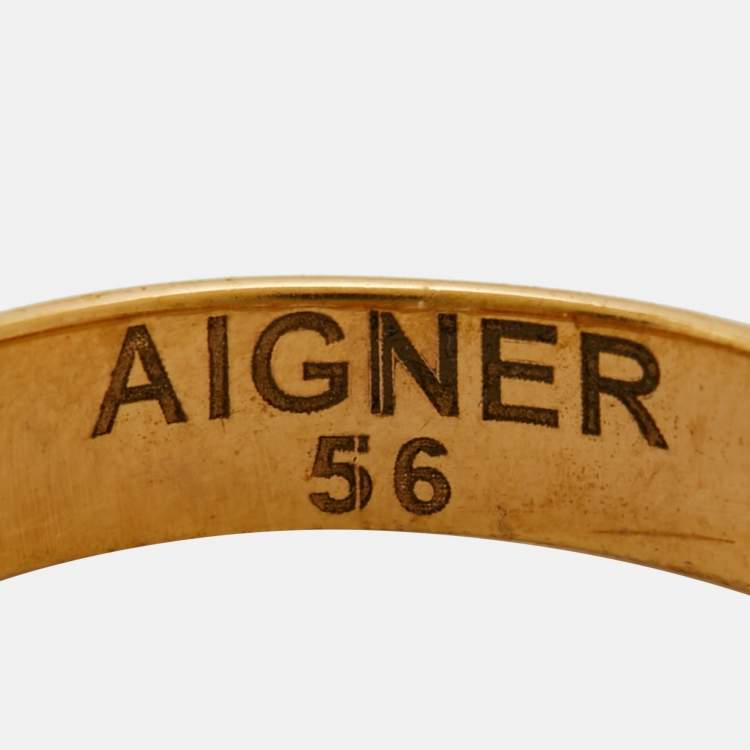 Pre Owned Aigner Logo Enamel Gold Tone Ring Size 56