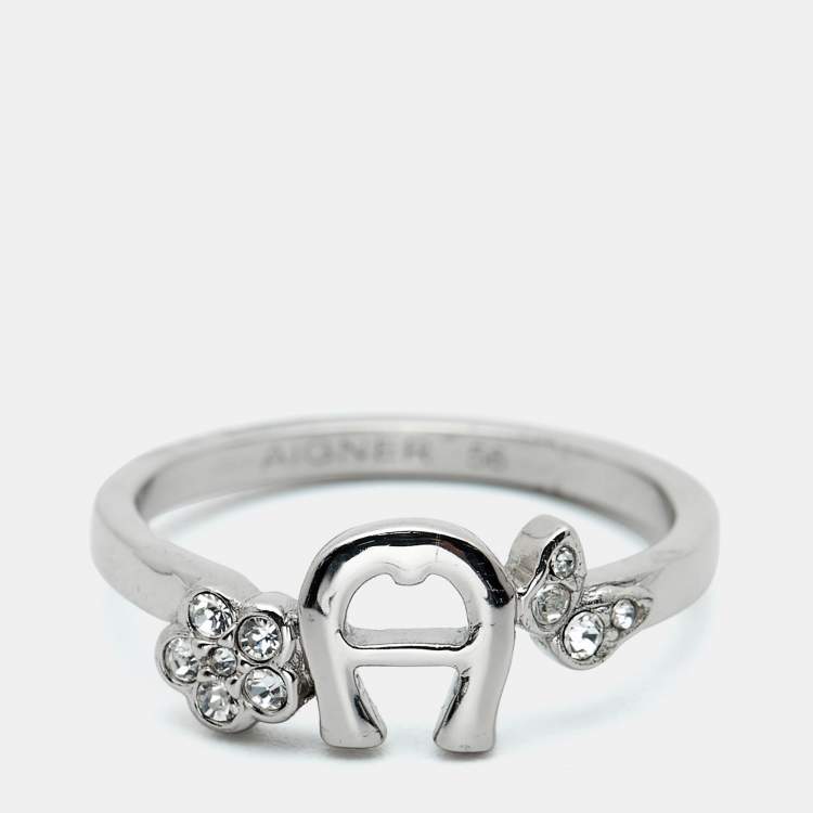 Pre Owned Aigner Logo Crystals Silver Tone Ring Size 56