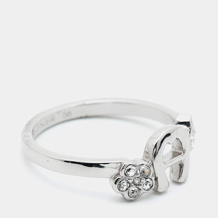 Pre Owned Aigner Logo Crystals Silver Tone Ring Size 56
