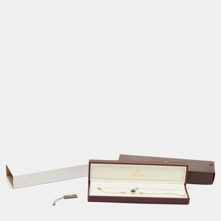 Pre Owned Aigner Logo Crystals Resin Gold Tone Bracelet