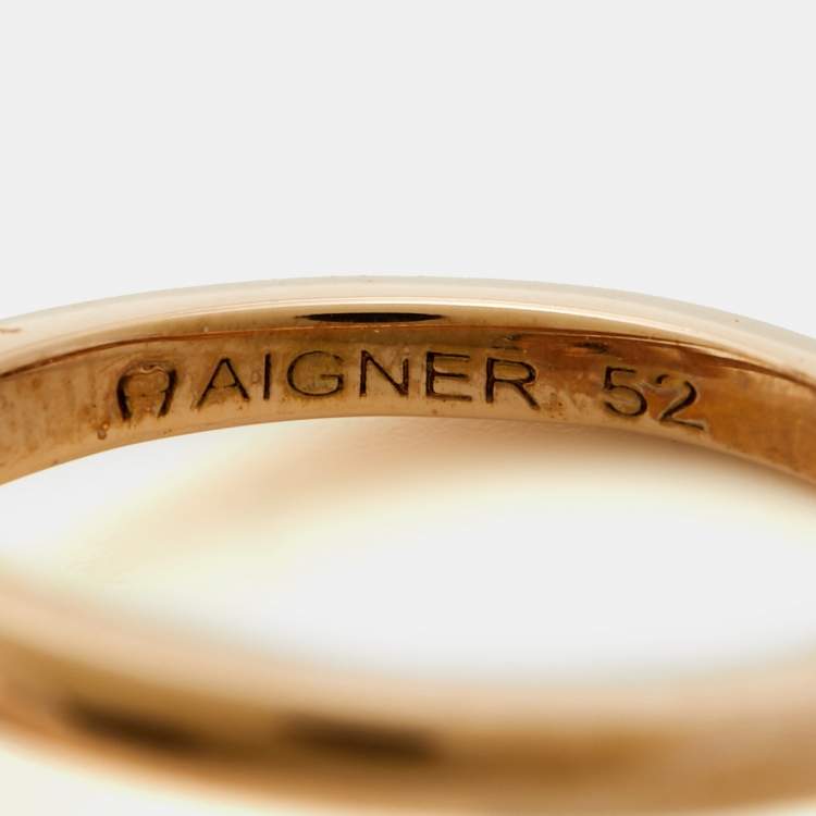 Pre Owned خاتم أيغنر لون روز ذهبي بشعار كريستال مقاس 52