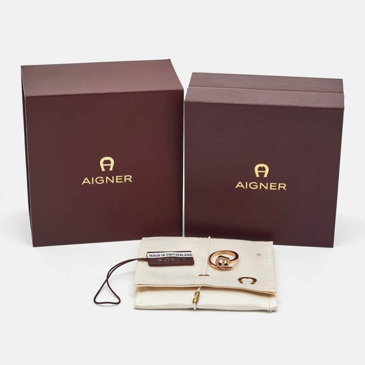 Pre Owned خاتم أيغنر لون روز ذهبي بشعار كريستال مقاس 52