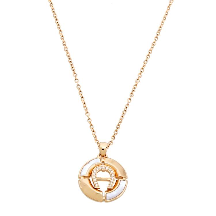 Pre Owned Aigner Gold Tone Crystal Logo Earring & Pendant Necklace Set