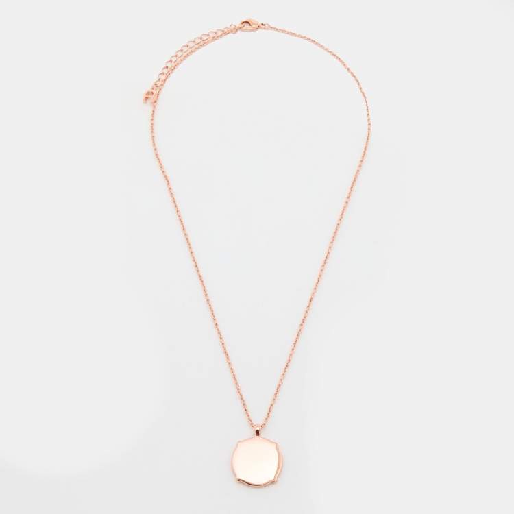 Pre Owned Aigner Rose Gold Tone Crystal & Mother of Pearl Logo Pendant Necklace