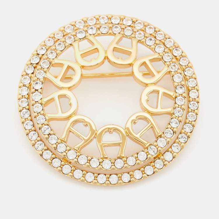 مملوكة مسبقًا Aigner Gold Tone Crystal Embellished Logo Round Brooch