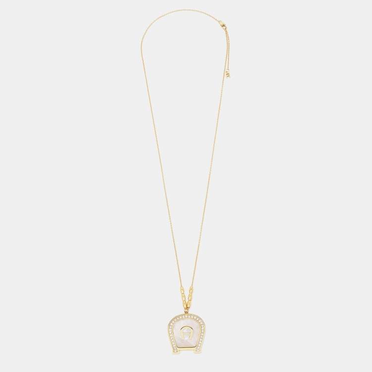 Pre Owned Aigner Gold Tone Crystal Mother of Pearl A Logo Pendant Necklace