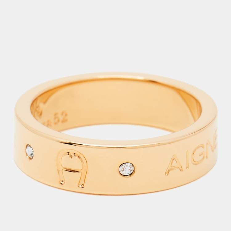 Pre Owned Aigner Gold Plated Crystal Logo Band Ring Size 52