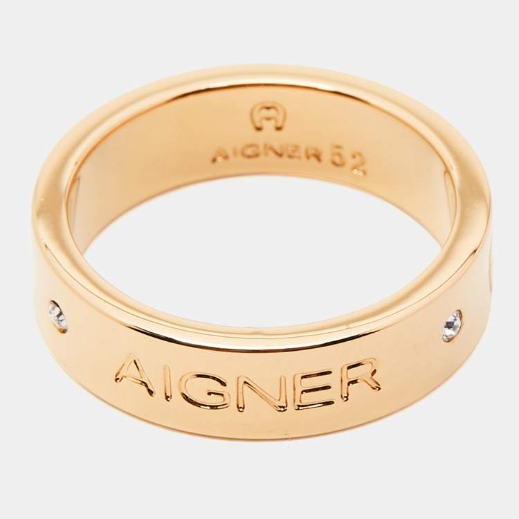 Pre Owned Aigner Gold Plated Crystal Logo Band Ring Size 52
