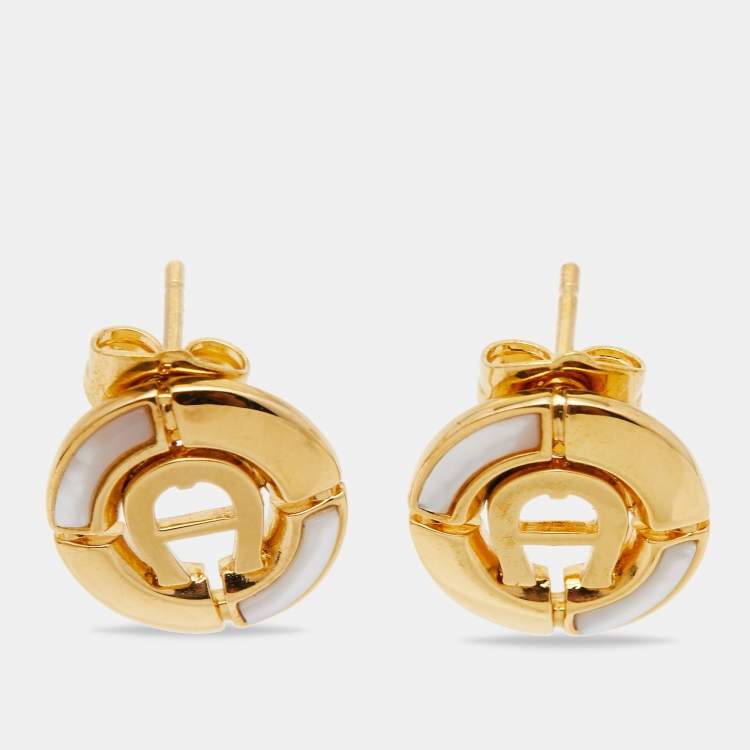 Pre Owned Aigner Gold Tone Mother of Pearl Crystal Logo Earring & Necklace Set