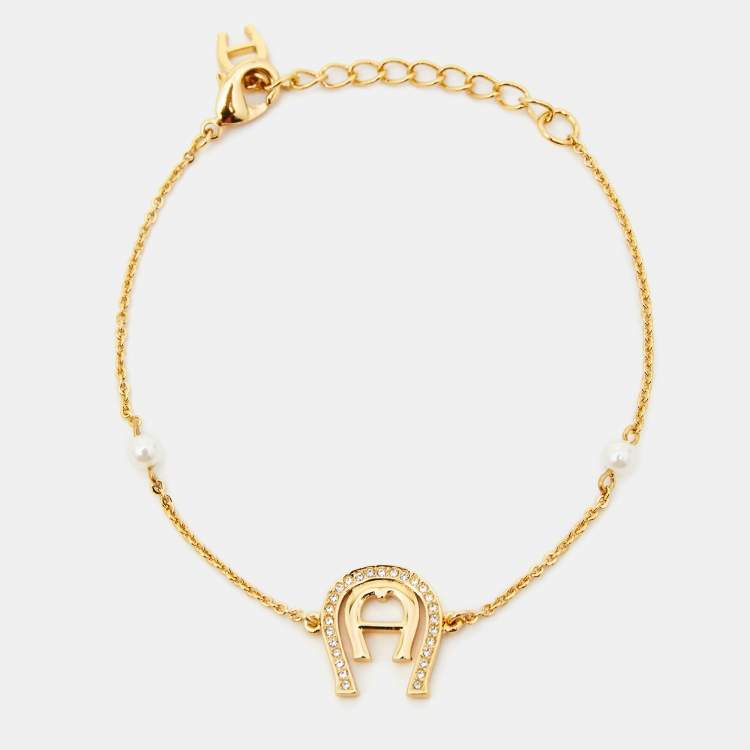 Pre Owned Aigner Crystal Faux Pearl Gold Tone Bracelet