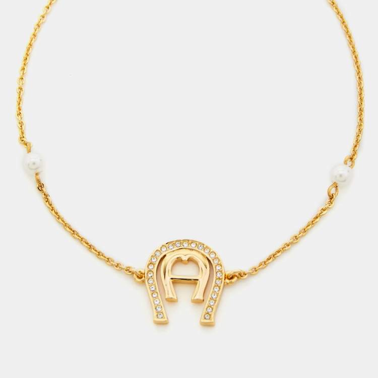 Pre Owned Aigner Crystal Faux Pearl Gold Tone Bracelet