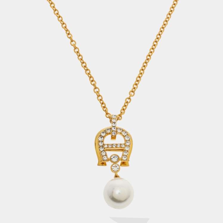 Pre Owned Aigner Crystal Faux Pearl Gold Tone Long Pendant Necklace