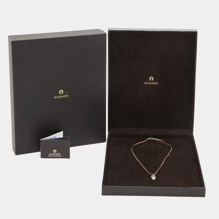 Pre Owned Aigner Crystal Faux Pearl Gold Tone Long Pendant Necklace