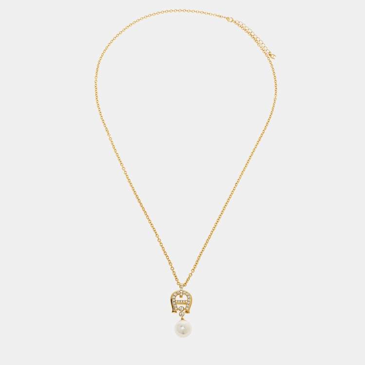 Pre Owned Aigner Crystal Faux Pearl Gold Tone Long Pendant Necklace
