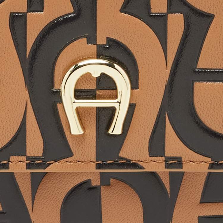 Pre Owned Aigner Black/Beige Monogram Embossed Leather Trifold Wallet