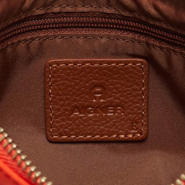 Pre Owned Aigner Orange/Tan Nylon and Leather Buckle Baguette Bag
