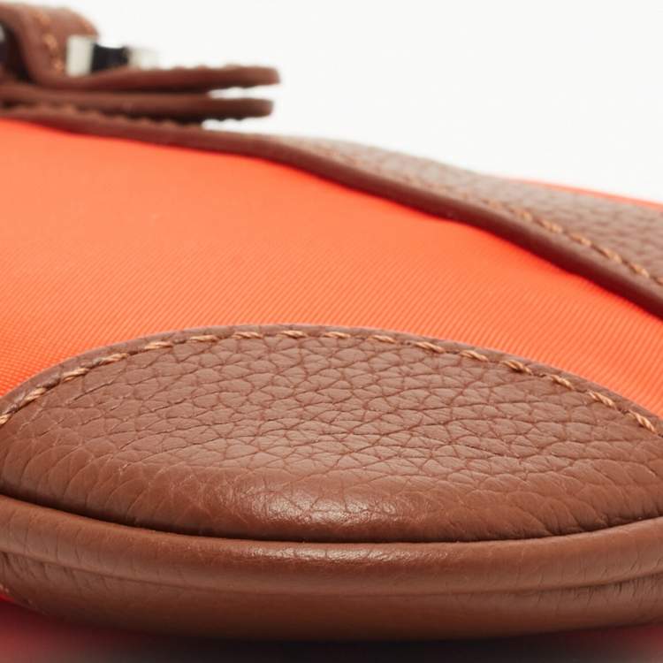 Pre Owned Aigner Orange/Tan Nylon and Leather Buckle Baguette Bag