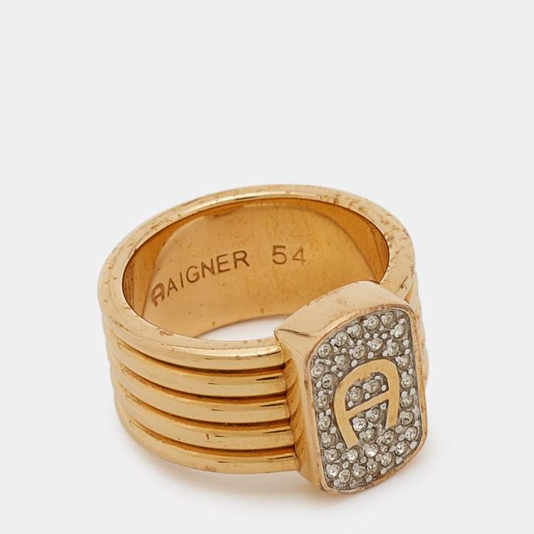 Pre Owned Aigner Gold Tone Crystal Logo Band Ring Size 54
