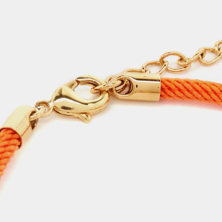 Pre Owned Aigner Orange Silk Cord Crystal Logo Yael Bracelet