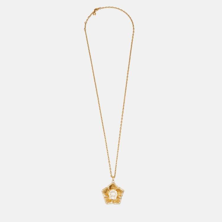 مملوكة مسبقًا Aigner Gold Tone Crystal Logo Flower Pendant Necklace