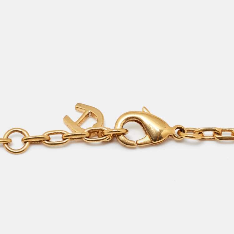 مملوكة مسبقًا Aigner Gold Tone Crystal Logo Flower Pendant Necklace