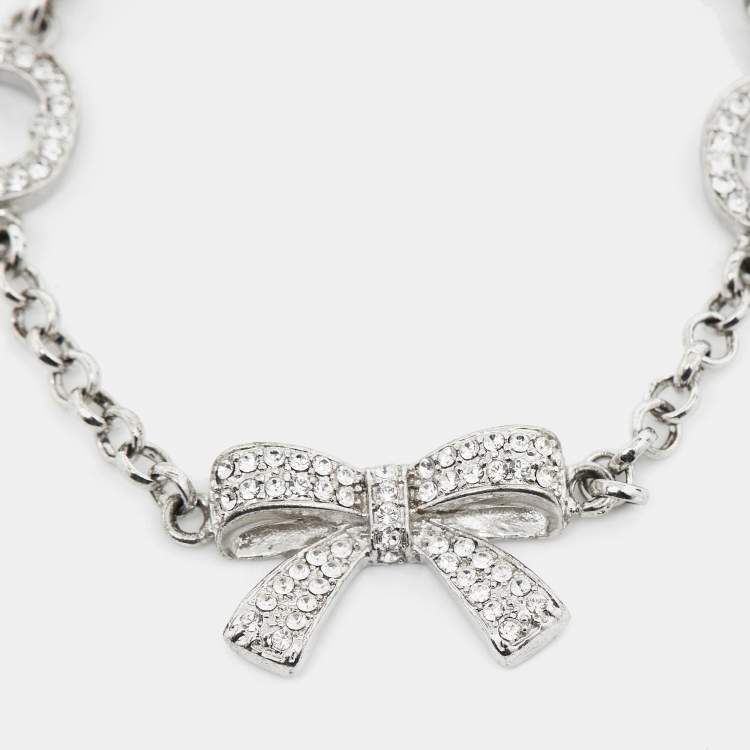 Pre Owned Aigner Logo Bow Crystals Silver Tone Bracelet