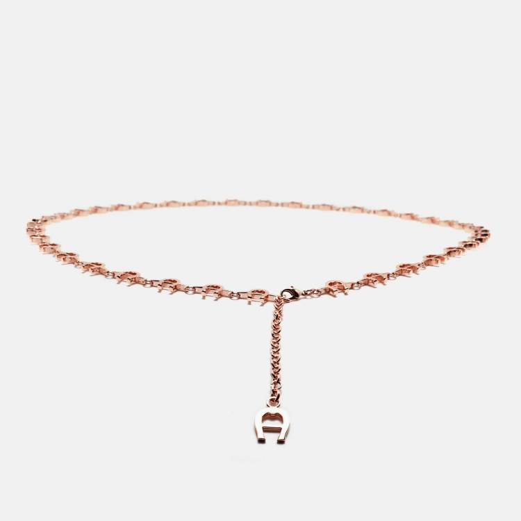 Pre Owned حزام أيغنر معدني بلون وردي مع شعار