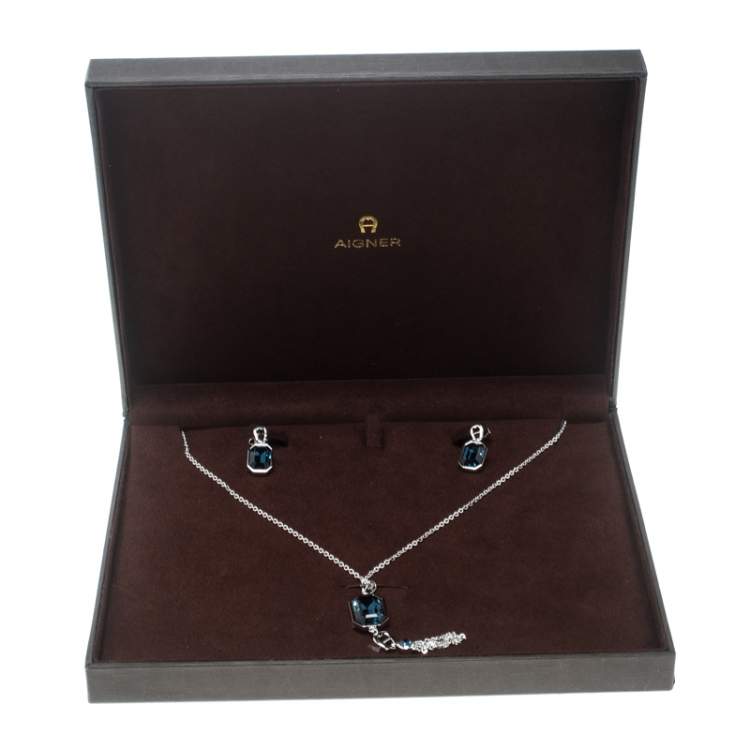 مملوكة مسبقًا Aigner Blue Crystal Silver Tone Pendant Earring Set 