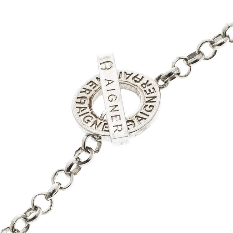 Pre Owned Aigner Crystal Studded Bow Silver Tone Long Toggle Necklace 
