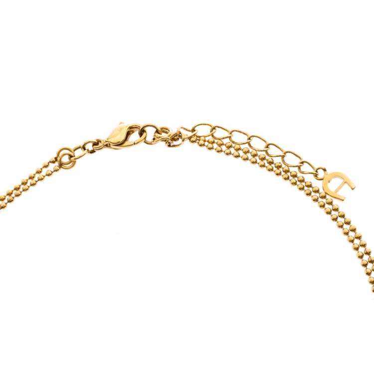 Pre Owned Aigner Gold Plated Crystal Paved Logo Charm Tasseled Necklace