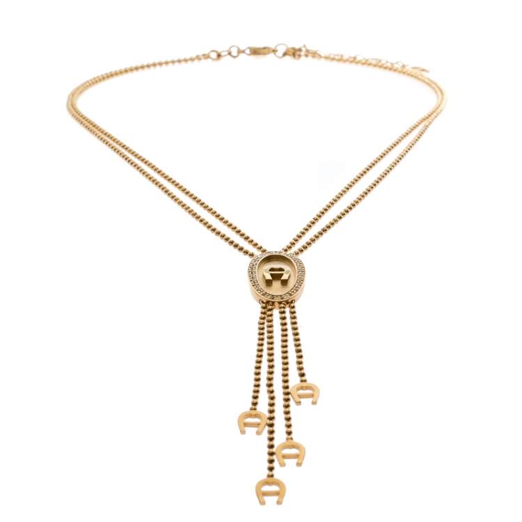 Pre Owned Aigner Gold Plated Crystal Paved Logo Charm Tasseled Necklace
