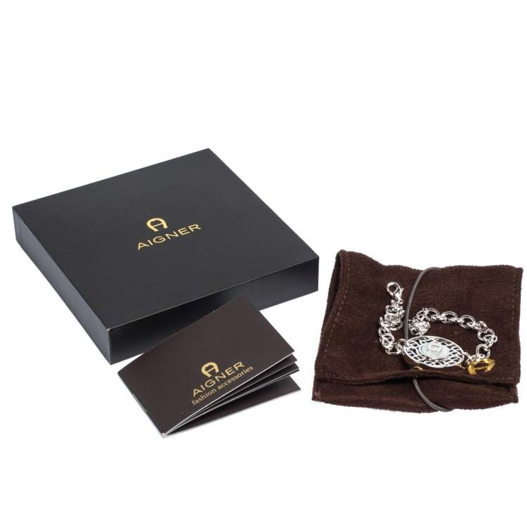 مملوكة مسبقًا Aigner Silver Tone Mother of Pearl Logo Bracelet