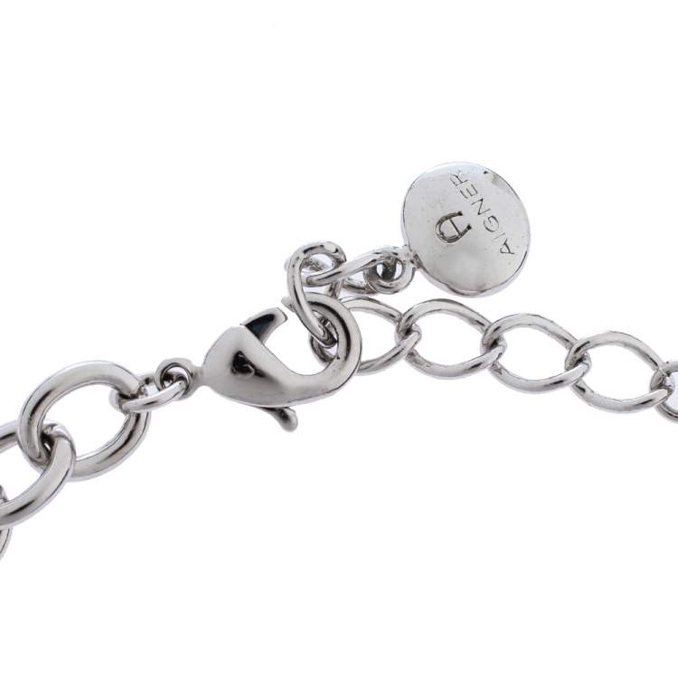 مملوكة مسبقًا Aigner Silver Tone Mother of Pearl Logo Bracelet