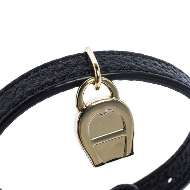 Pre Owned Aigner Black Leather Gold Tone Logo Charm Bracelet