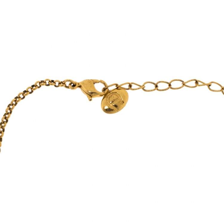 Pre Owned Aigner Gold Tone Crystal Embellished Floral Pendant Necklace 