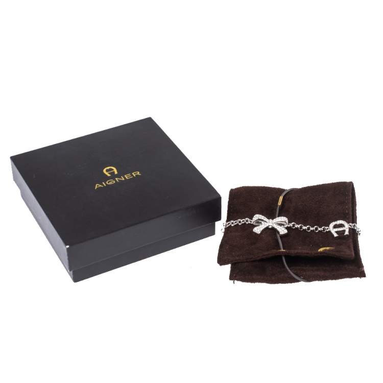 Pre Owned Aigner Silver Tone Crystal Embellished Bow Toggle Bracelet