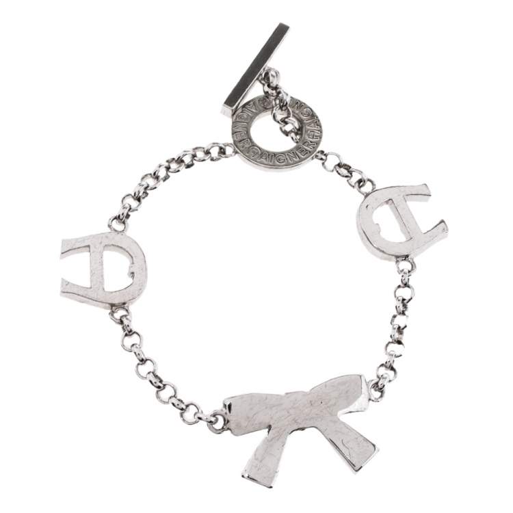 Pre Owned Aigner Silver Tone Crystal Embellished Bow Toggle Bracelet